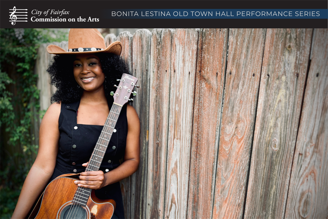 Roberta Lea leaning on a fence while holding a guitar with the Bonita Lestina series header above her